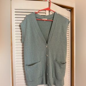EARTHBOUND small light blue sweater vest shirt, button front and front pockets.